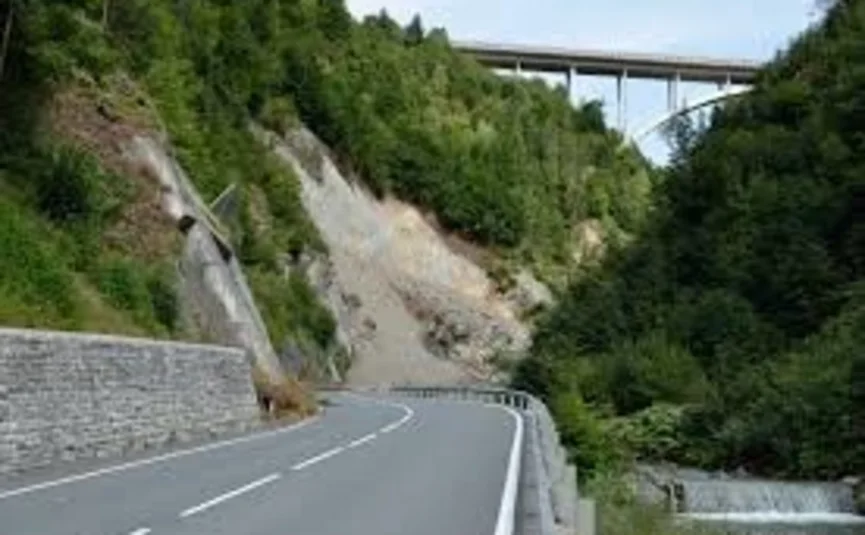 Großglockner tour Curvy mountain road with landslide and bridge in background