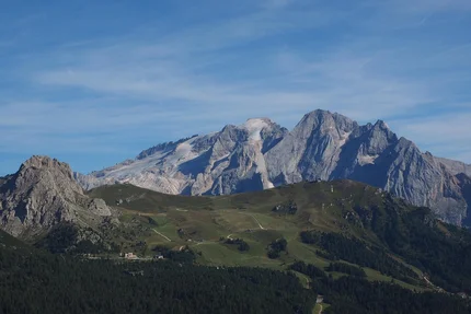 Mountain landscape with green hills and blue sky