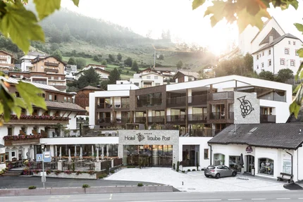 Hotel Traube Post in mountain village at sunset