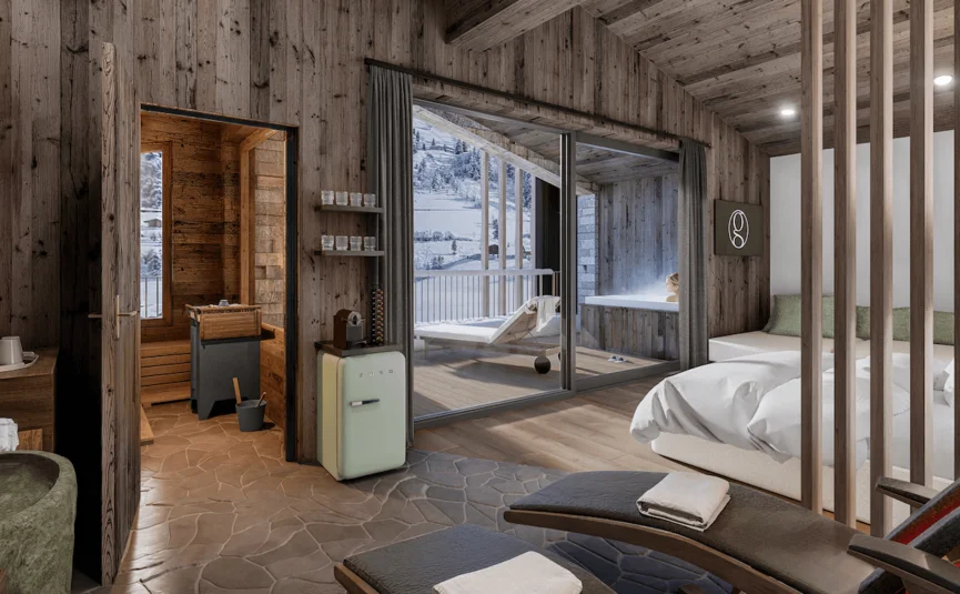 Rustikales Schlafzimmer mit Badewanne, Balkon und verschneiter Berglandschaft